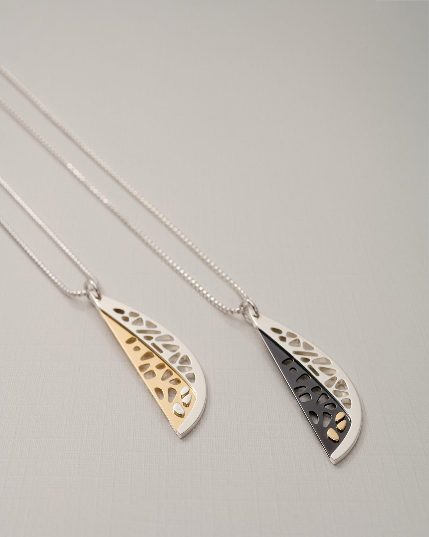 The Slice | Contemporary Art Jewelry | Pendant Necklace | Silver, Black Niobium & Gold