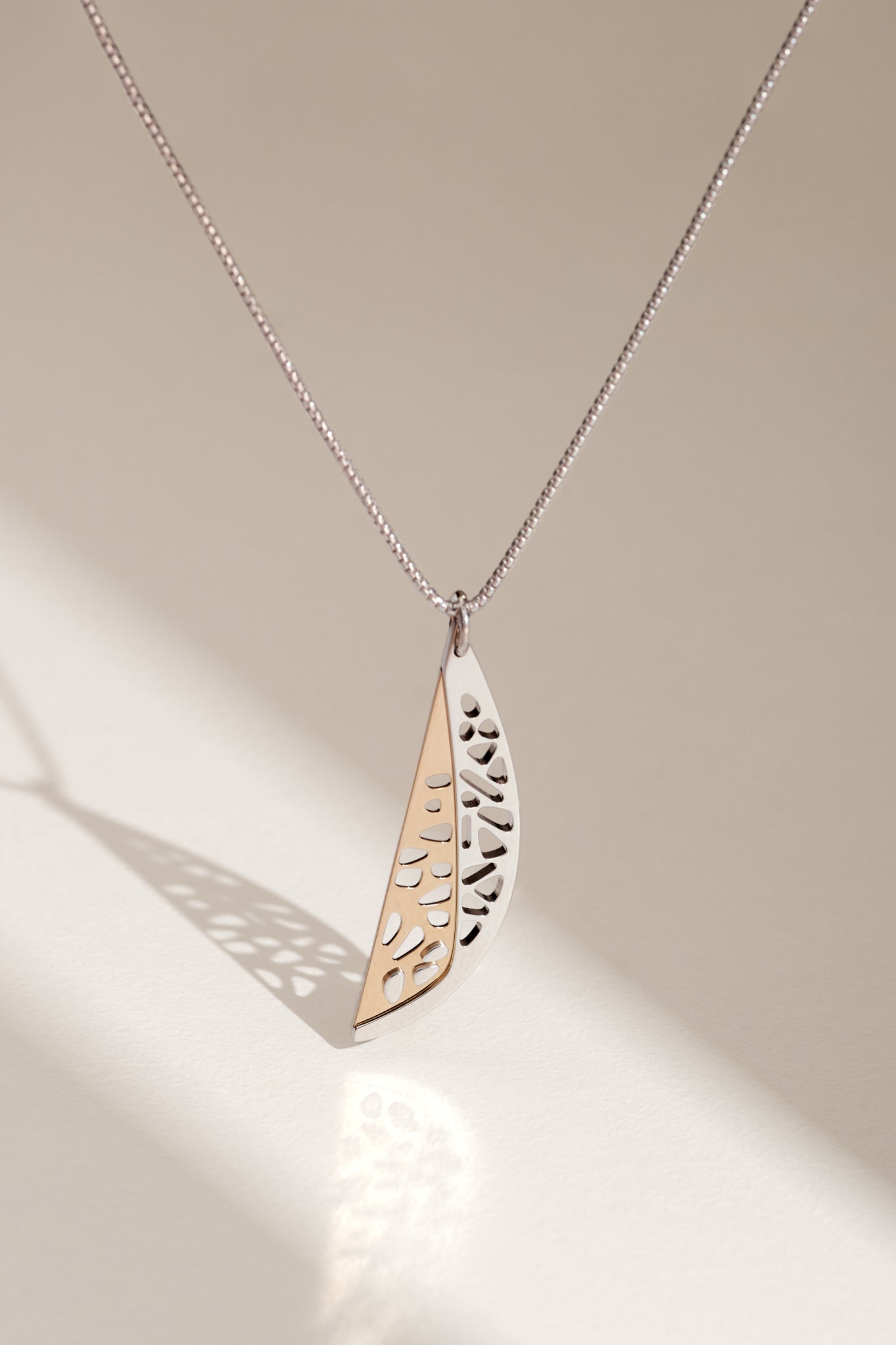 Unique contemporary pendant gold and silver