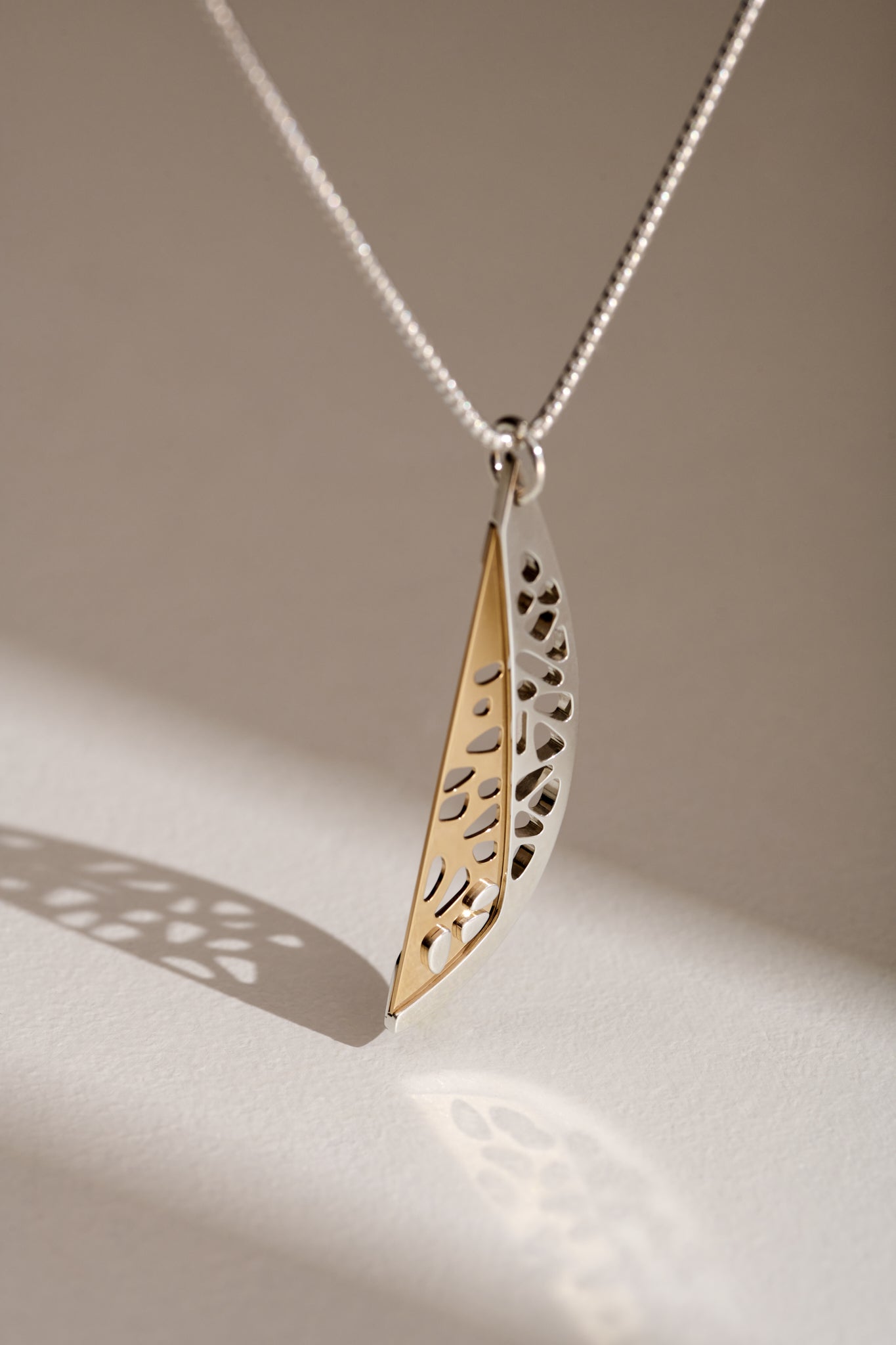 Unique contemporary pendant gold and silver