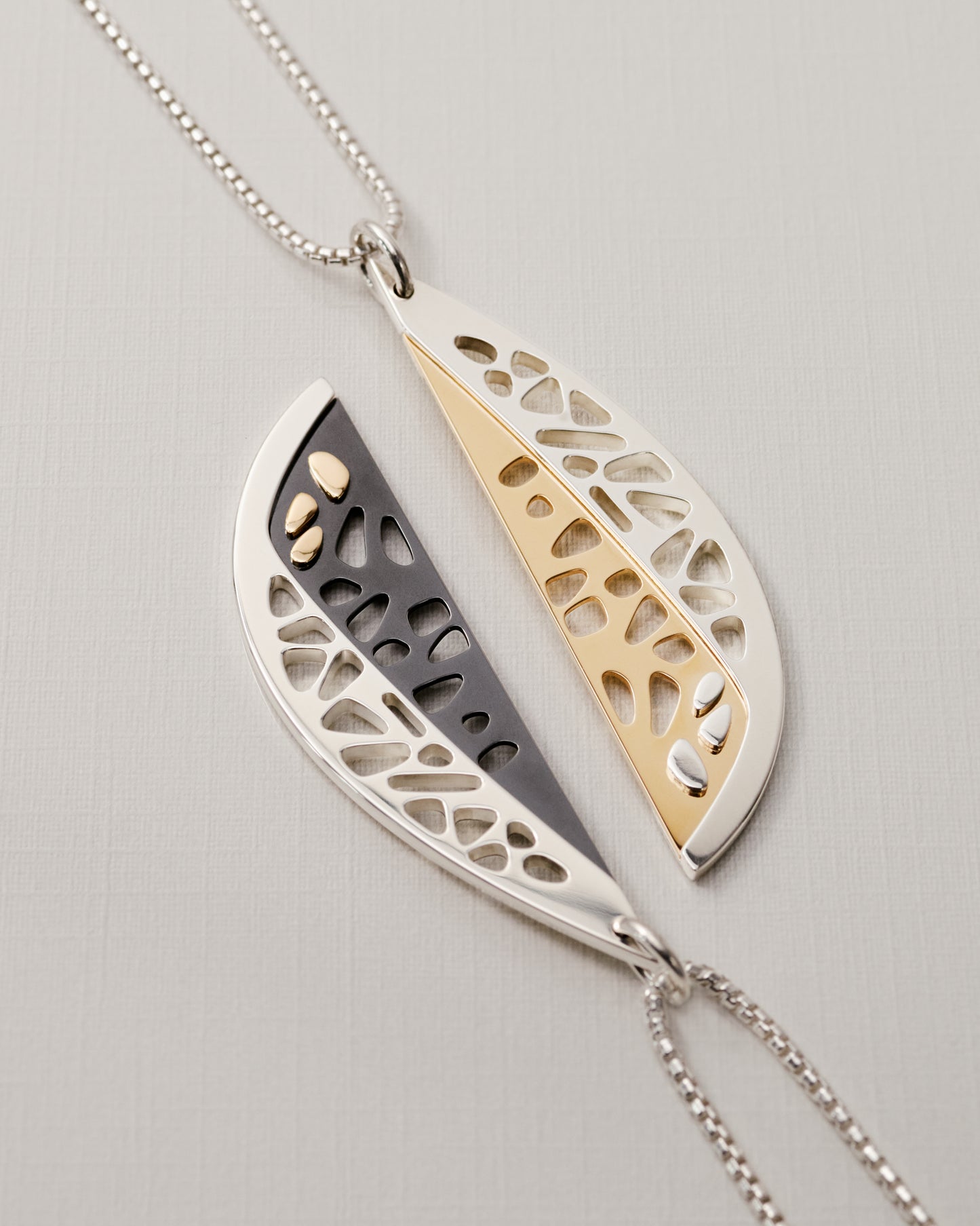 Unique contemporary pendant gold and silver and silver and black